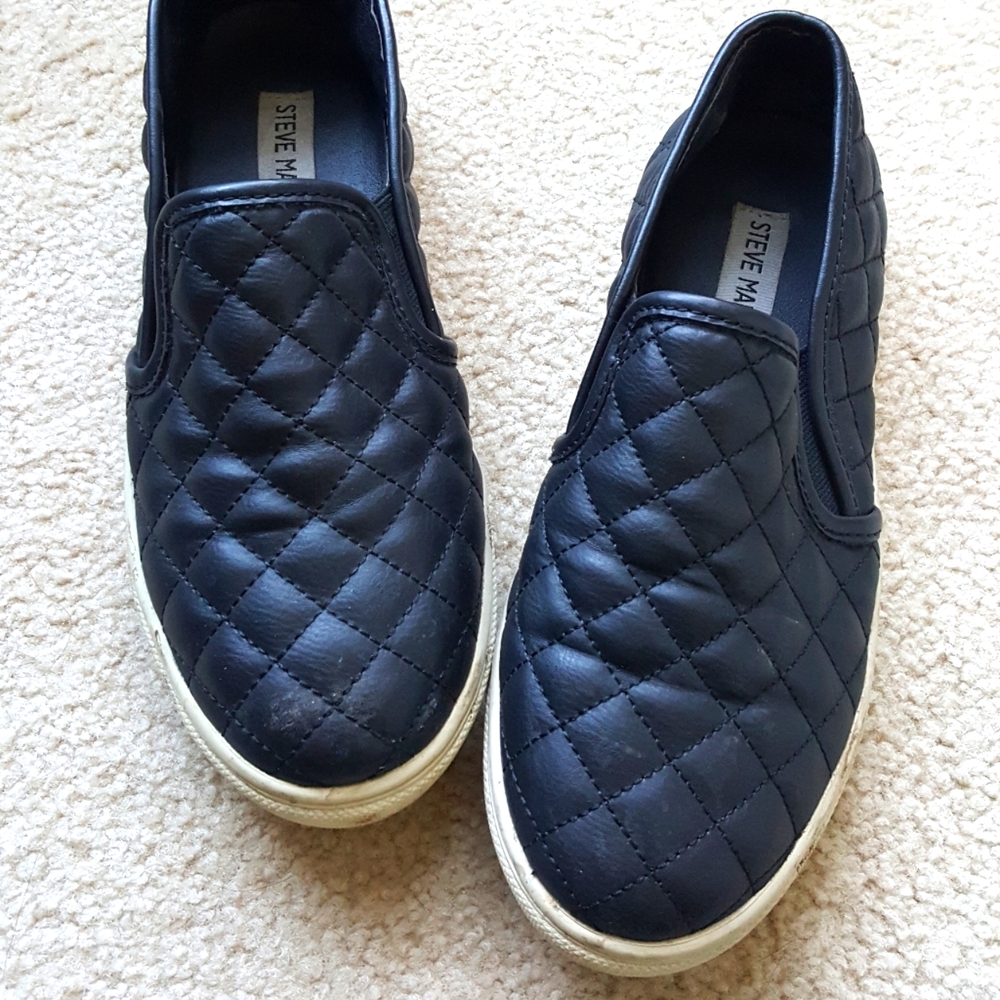 Quilted black slip on sneakers